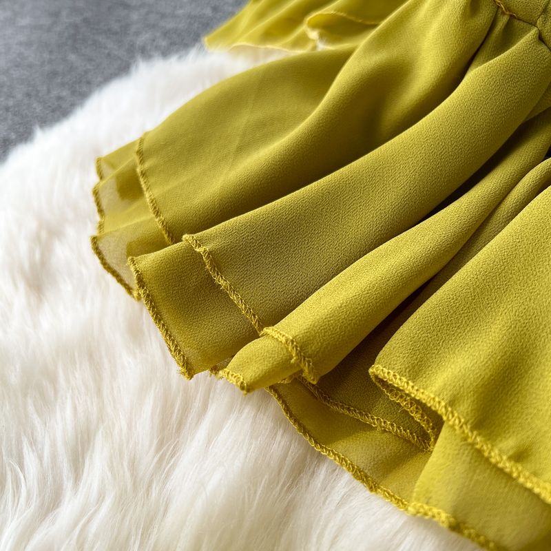 Vêtements pour femmes Costume de vacances pour femmes 2023 nouvelle chemise en mousseline de soie à bretelles à épaules dénudées à volants et pantalon large plissé drapé_voghion.com