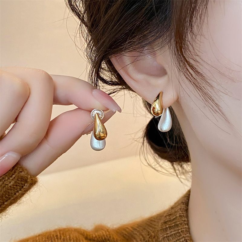 Zweifarbige Mercury Needle Einfaches Design Sinn Persönlichkeit Vielseitiger Ohrstecker Kann Auf Zwei Arten Getragen Werden Gold Und Silber Doppelt_voghion.com