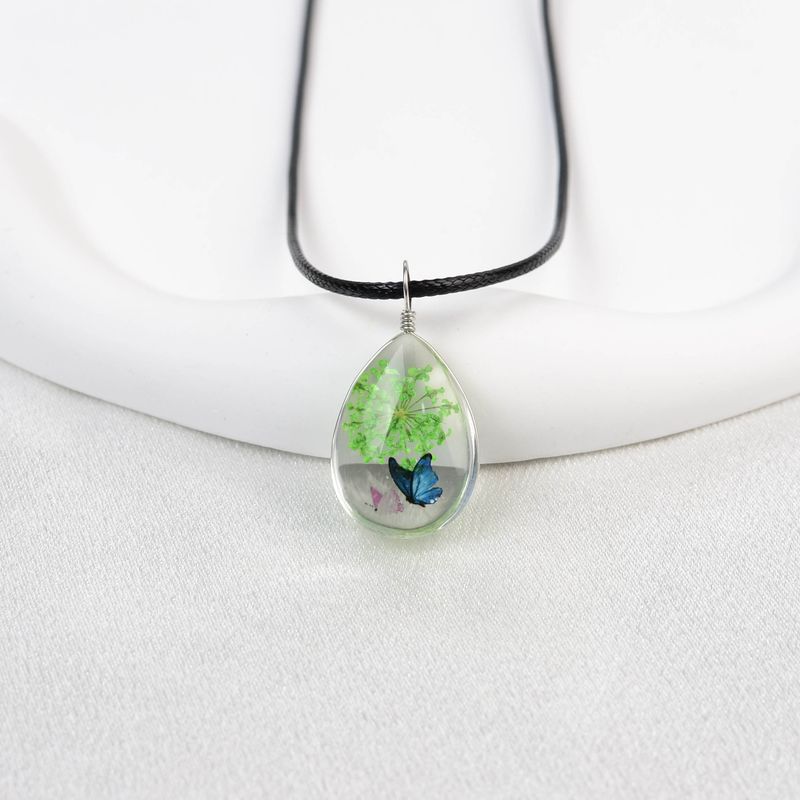 Collana con fiore in pizzo e cielo stellato in stile fresco, goccia d'acqua in vetro, tempo Jingdezhen, vendita calda_voghion.com