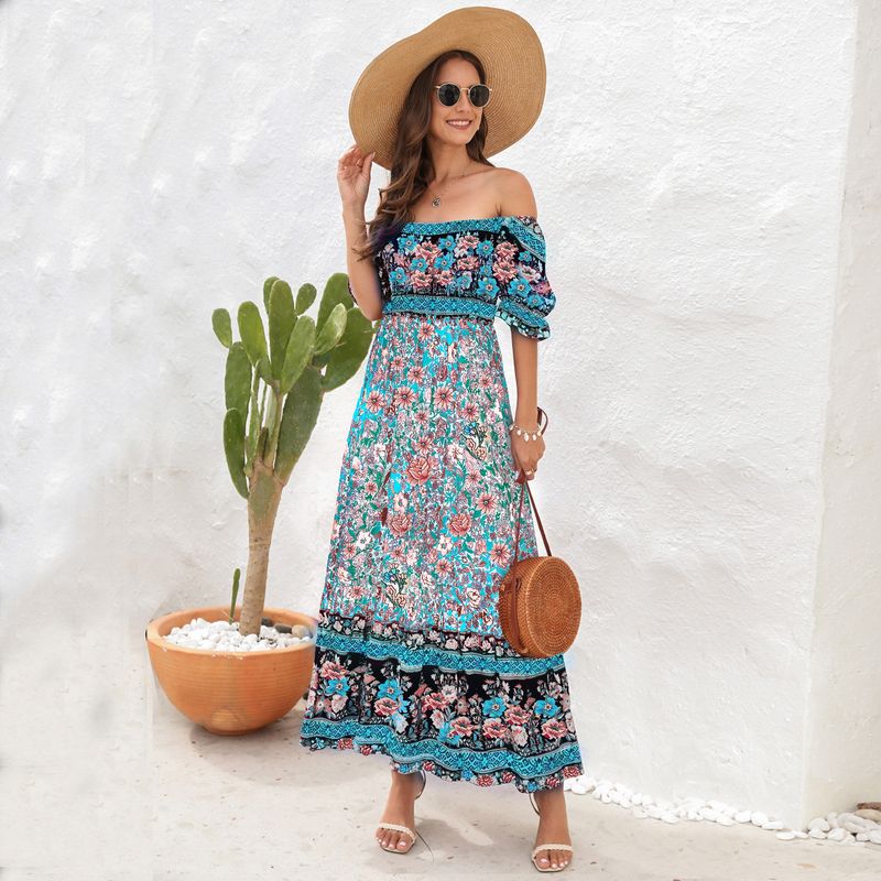 K Bohemian-Strandkleid mit schulterfreien Puffärmeln und Midi-Länge. Kein Hut oder andere Accessoires._voghion.com