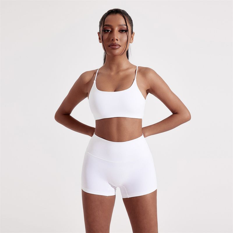 Summer Solid Color Yoga Set Two-Piece Sexy Back Cross Sports Bra + Barely There Tight-Fitting Three-Quarter Shorts_voghion.com