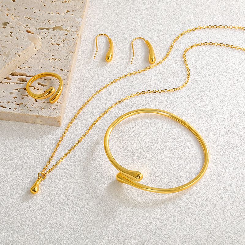 Conjunto de quatro peças de colar gota d'água, moda diária simples, conjunto de colar, brincos, anel e pulseira_voghion.com