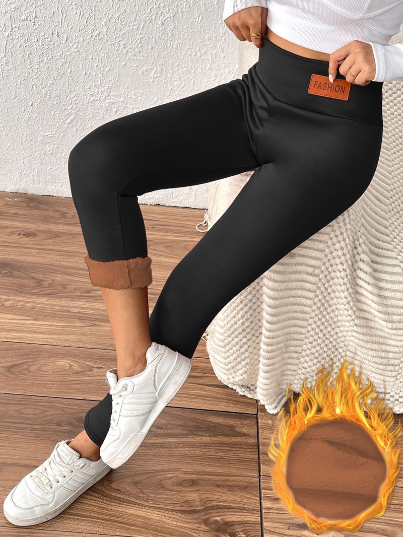 Pantaloni caldi in pelle di agnello color caffè per le donne in inverno, vita alta e snellenti con fodera in pile_voghion.com