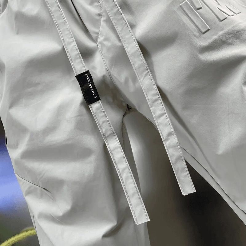 Leggings pour hommes, imprimé lettres fines, style coréen, pantalon de jogging slim à séchage rapide avec poignets élastiques, pour le sport et les loisirs_voghion.com