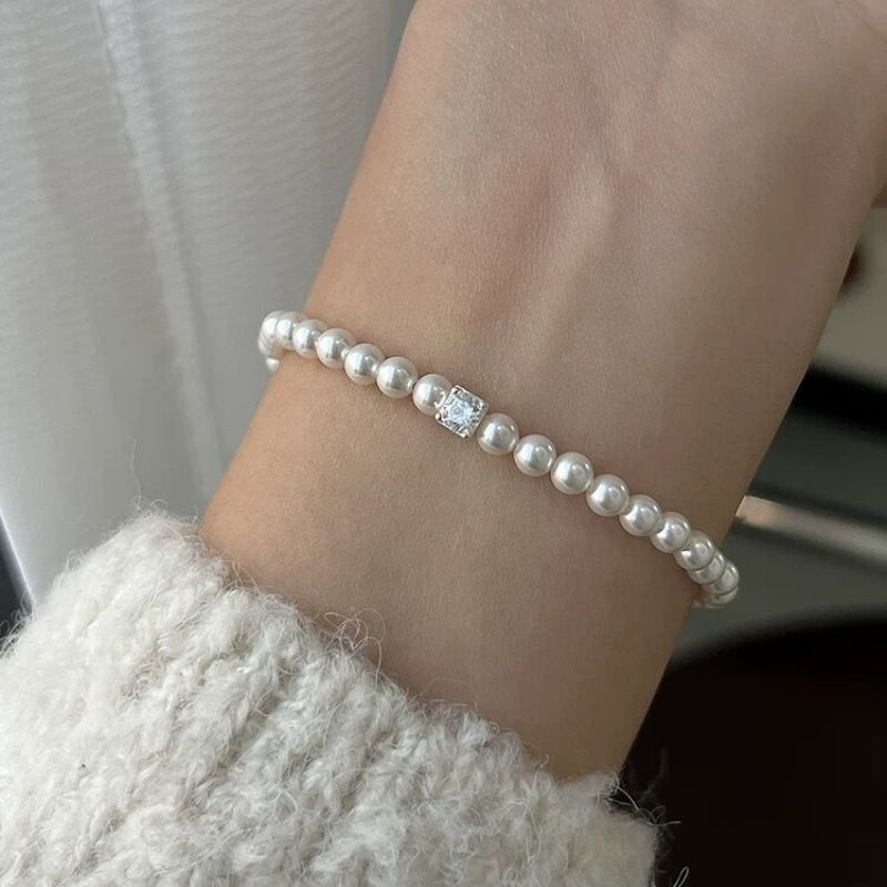Liten utsøkt zirkon sukkerbit Shijia perle elastisk armbånd lys luksus fransk elegant armbånd jenter smykker engros_voghion.com
