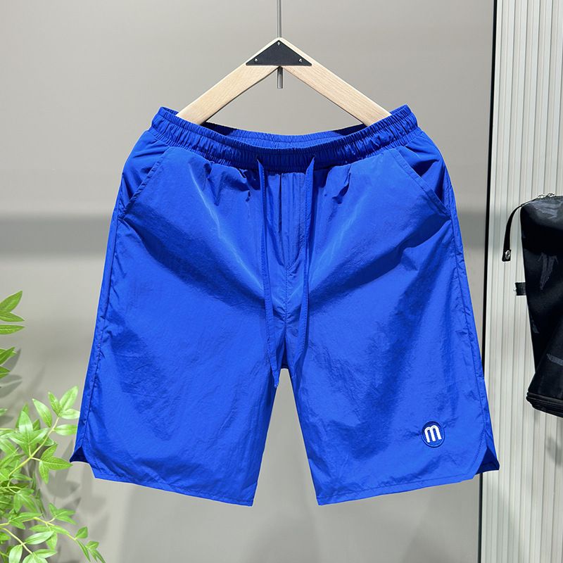 Pantaloncini estivi color caramella per coppie, popolari su Internet, pantaloni versatili da cinque pollici da uomo dello stesso stile, pantaloni da spiaggia alla moda coreani_voghion.com
