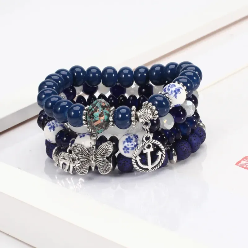 Bohemian Armbandset für Damen, stapelbares Armband mit Schmetterlings-, Elefanten- und Ankeranhänger, Perlen 241125_voghion.com