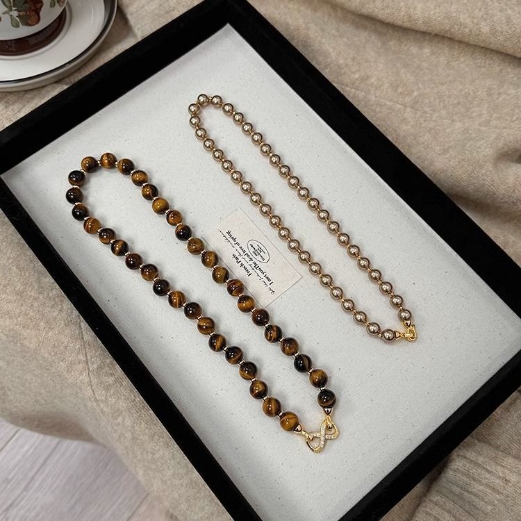 Mikro eingelegte 8-förmige Schnalle abnehmbar Herbst und Winter Maillard Tigerauge Stein Gold braun Shijia Perle Doppelschicht_voghion.com