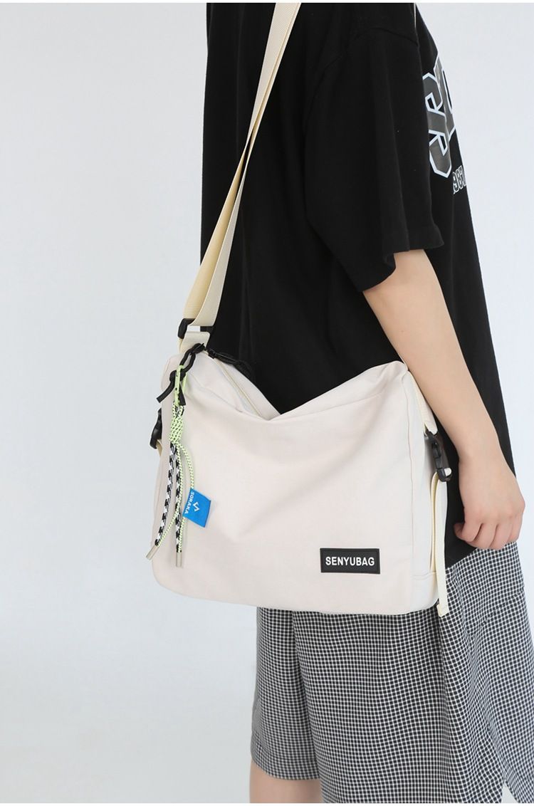 Umhängetasche für Herren Instagram Fashion Brand 2024 Neue große Kapazität Herrentasche Canvas Postman Bag Damen Single Shoulder Bag Japanische Serie_voghion.com