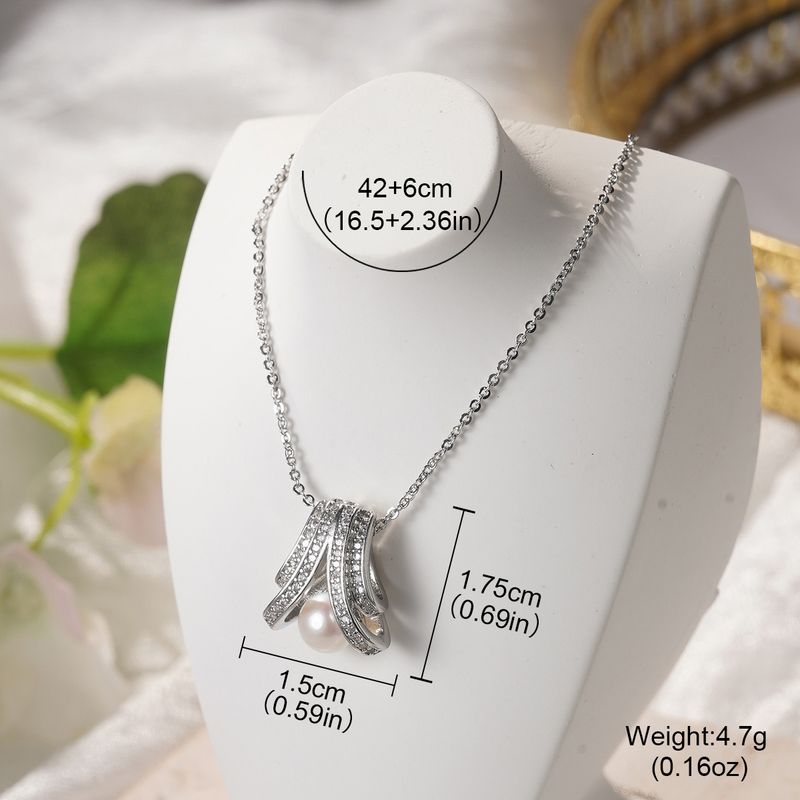 Collana elegante e versatile da donna, con ciondolo a forma di farfalla, in stile retrò francese, con zirconi intarsiati e fiore a quattro foglie._voghion.com