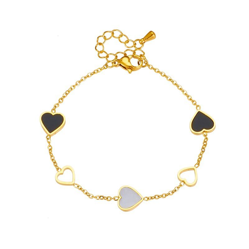 Pulsera de acero de titanio con diseño de nicho de moda, en blanco y negro, con diseño de amor hueco, sencilla y versátil para uso diario._voghion.com
