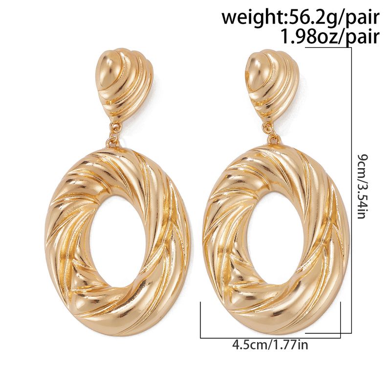 Personality metal geometric texture hollow earrings female irregular twisted glossy earrings earrings_voghion.com