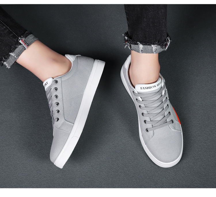 2024 nuove scarpe di tela basse da uomo in stile coreano scarpe da studente alla moda per giovani produttori di scarpe casual da uomo all'ingrosso_voghion.com