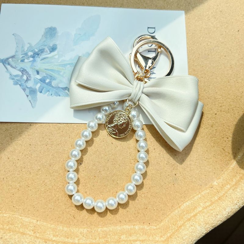 Creative Fashion Bow Camellia Pearl String Car Keychain Women's Bag Pendant Phone Charm_voghion.com