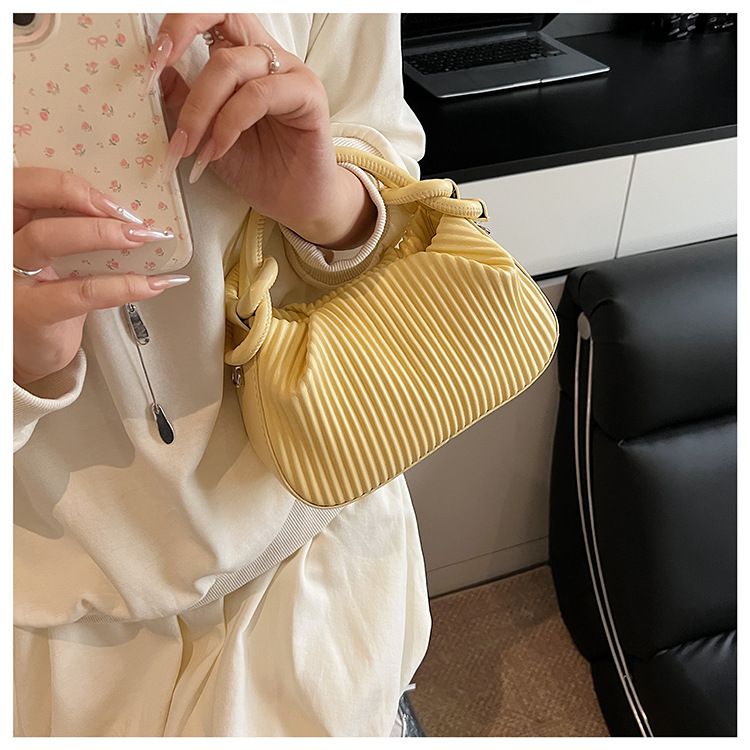 Borsa a mano a righe plissettata con personalità di nicchia per donna, borsa a secchiello versatile alla moda 2025, borsa a tracolla semplice estiva_voghion.com