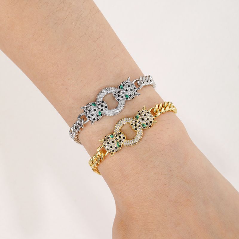 Bracciale da uomo e da donna in rame micro pavé di zirconi, placcato oro vero, stile punk hip hop, con doppia testa di leopardo_voghion.com