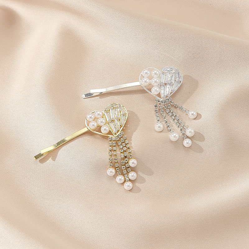 Forcina per capelli da donna coreana leggera di lusso con zirconi stile celebrità temperamento forcina per capelli frangia laterale clip in rete rossa perla clip_voghion.com