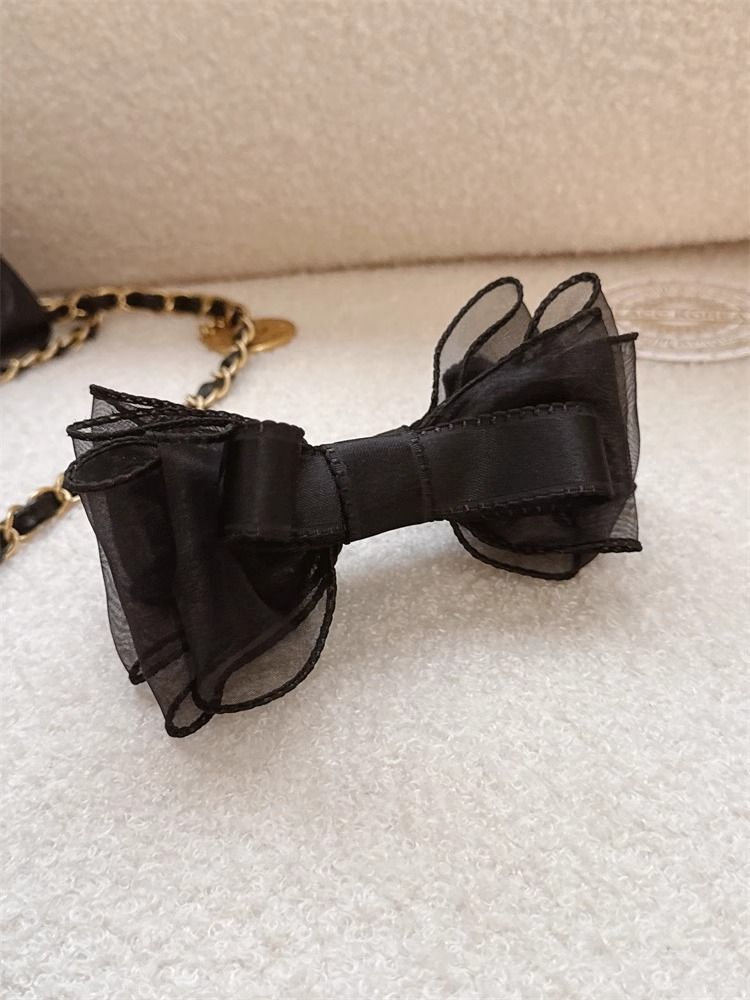 Versione coreana del copricapo a coda di cavallo alta con fiocco a doppia rete in stile principessa, 2025, nuovo e versatile._voghion.com