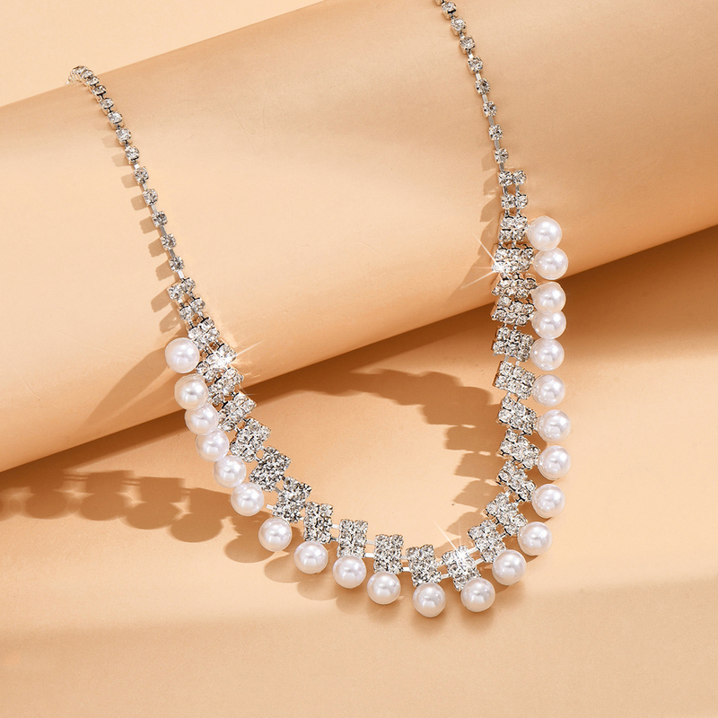 Nuovo set di orecchini con collana di strass di perle finte da donna, lusso leggero, di nicchia e versatile_voghion.com