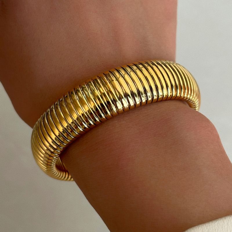Bracciale Gypsy elastico in acciaio al titanio placcato oro vero_voghion.com