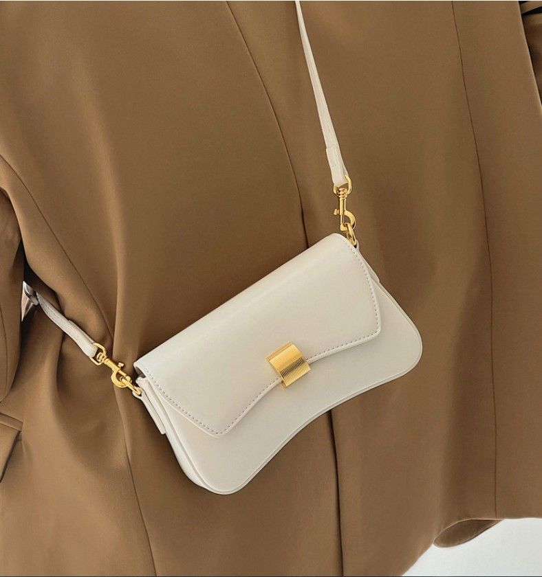 Borsa per donna 2024 design di nicchia nuova borsa a tracolla piccola con tracolla singola a forma di bastone francese da donna di alta qualità_voghion.com