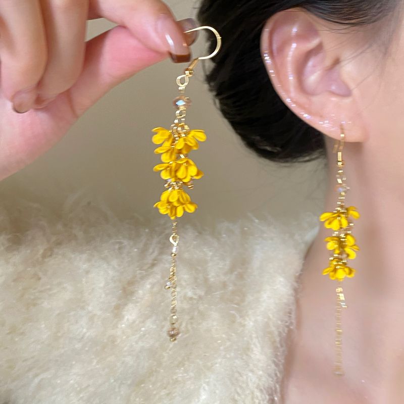 Orecchini a spirale antizanzara con nappa lunga in stile foresta di osmanto dorato autunnale, design di nicchia dolce, ganci per orecchini di alta qualità_voghion.com