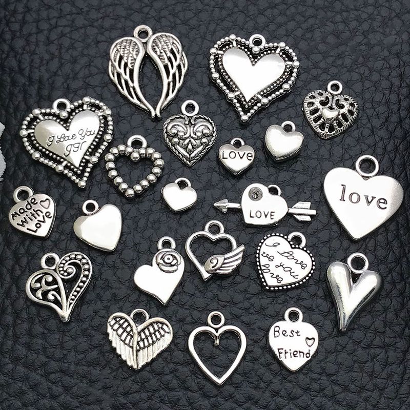 Risultati di gioielli 20 accessori fai da te in lega per gioielli Collana Orecchini a cuore color pesca massiccio Ciondolo Braccialetto fatto a mano con ciondolo a forma di amore cavo_voghion.com