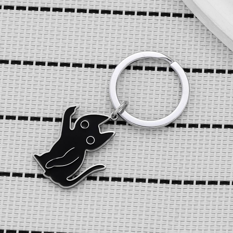 Portachiavi a forma di gattino scontento, divertente, in acciaio inossidabile, con ciondolo a forma di gatto nero con dito medio verticale._voghion.com