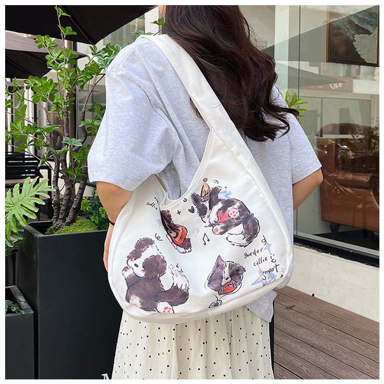 2024 New Spring Outing Dog Shoulder Versatile Large Capacity Canvas Student Commuter Tote Women's Outgoing Bag_voghion.com