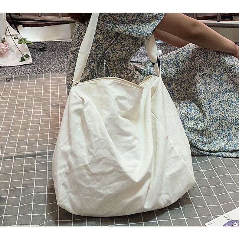 Fan Han Feng Borsa a tracolla singola Semplice e casual Borsa a libro pigra in tela tinta unita versatile Instagram da donna_voghion.com