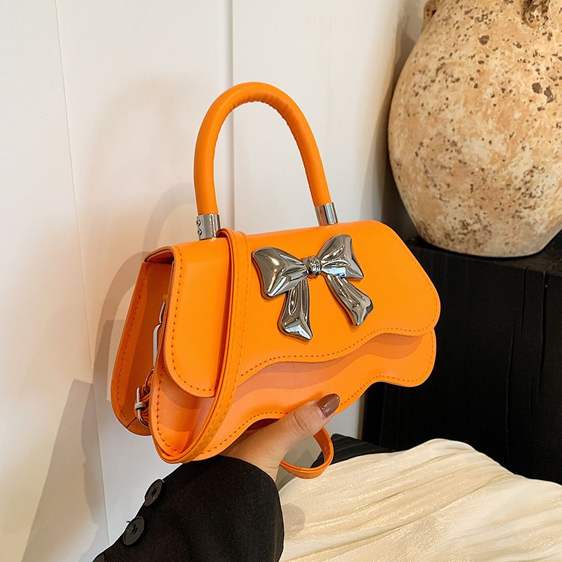 Borsa a tracolla singola con design di nicchia, semplice ed elegante, con fiocco, per donna, nuova borsa a tracolla primavera estate 2024_voghion.com