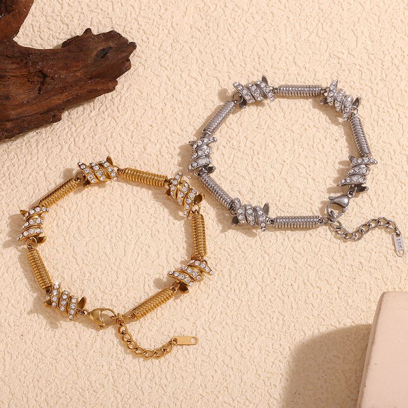 Braccialetto unico con micro-intarsi e nodo a molla placcato oro in acciaio inossidabile per uomo, stile hip-hop_voghion.com