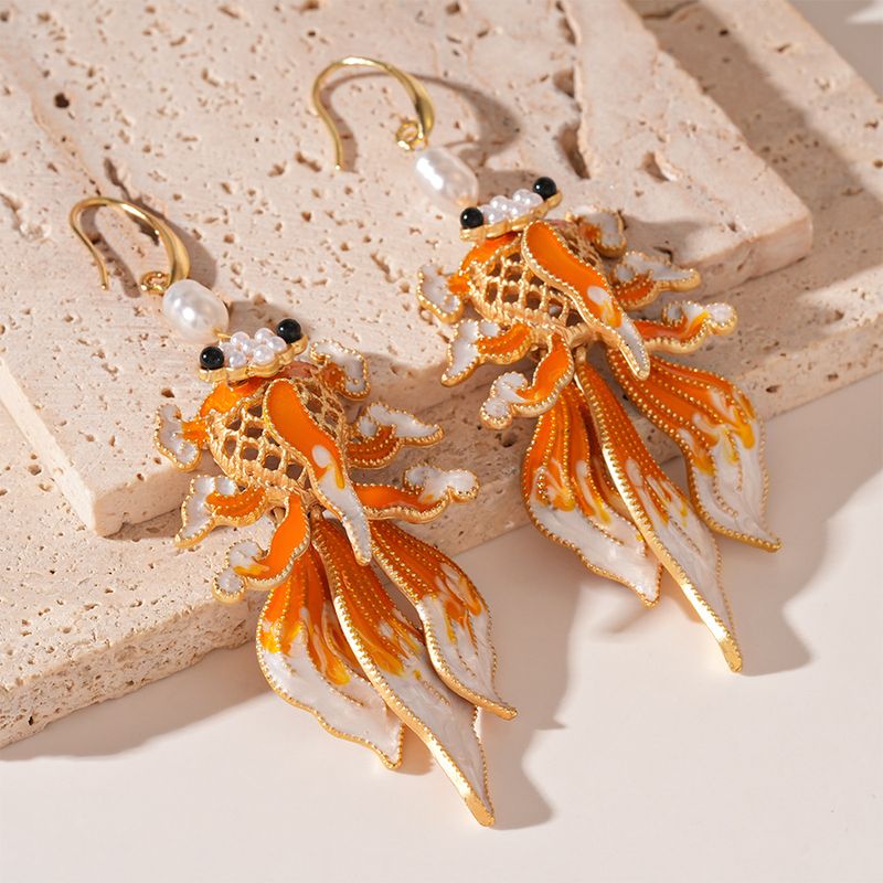 Dripping pearlescent goldfish ear hook earrings New Year's festive temperament retro earrings_voghion.com