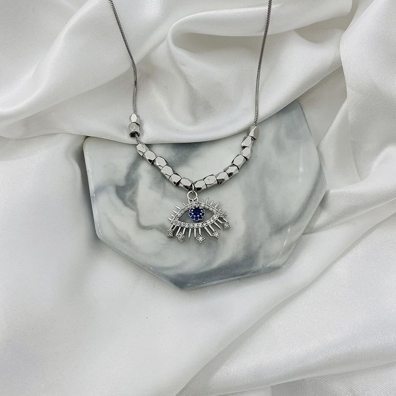 Collana con ciondolo a forma di occhi di zircone di alta qualità e catena a forma di osso, design unico e di lusso alla moda del 2022_voghion.com