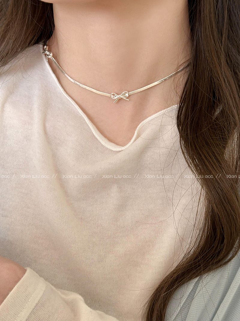 Collana con catena a forma di serpente con fiocco, design di nicchia per donna, collana di alta gamma, nuova collana popolare 2024, gioielli in stile freddo_voghion.com
