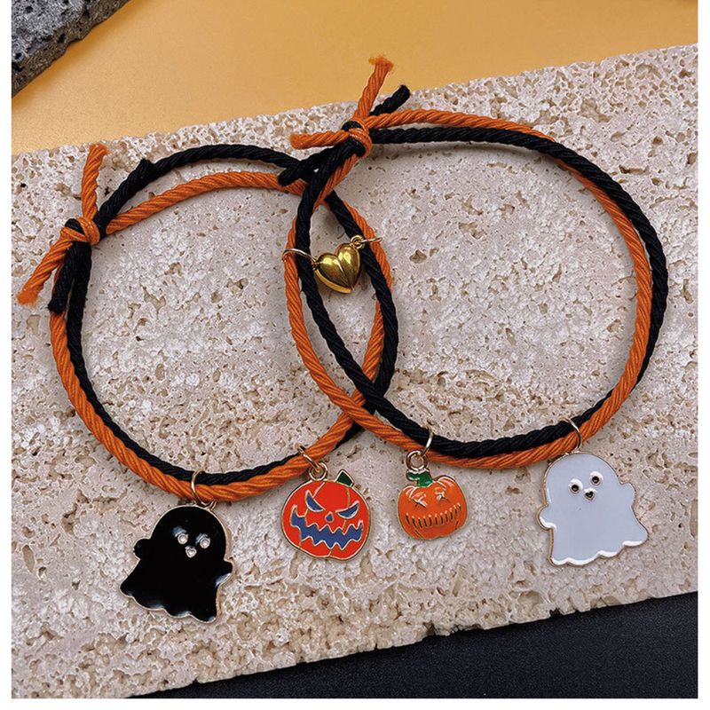 Het försäljning nya Halloween armband tecknad pumpa spöke hand med kärlek hjärta magnetisk par set hand rep_voghion.com