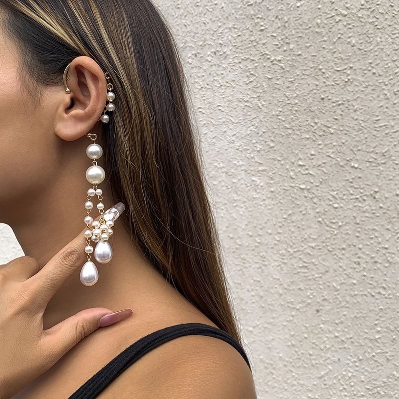 Design di gioielli: orecchini con nappe di perle senza fori, pendenti, temperamento femminile, stile cool, con clip a osso._voghion.com