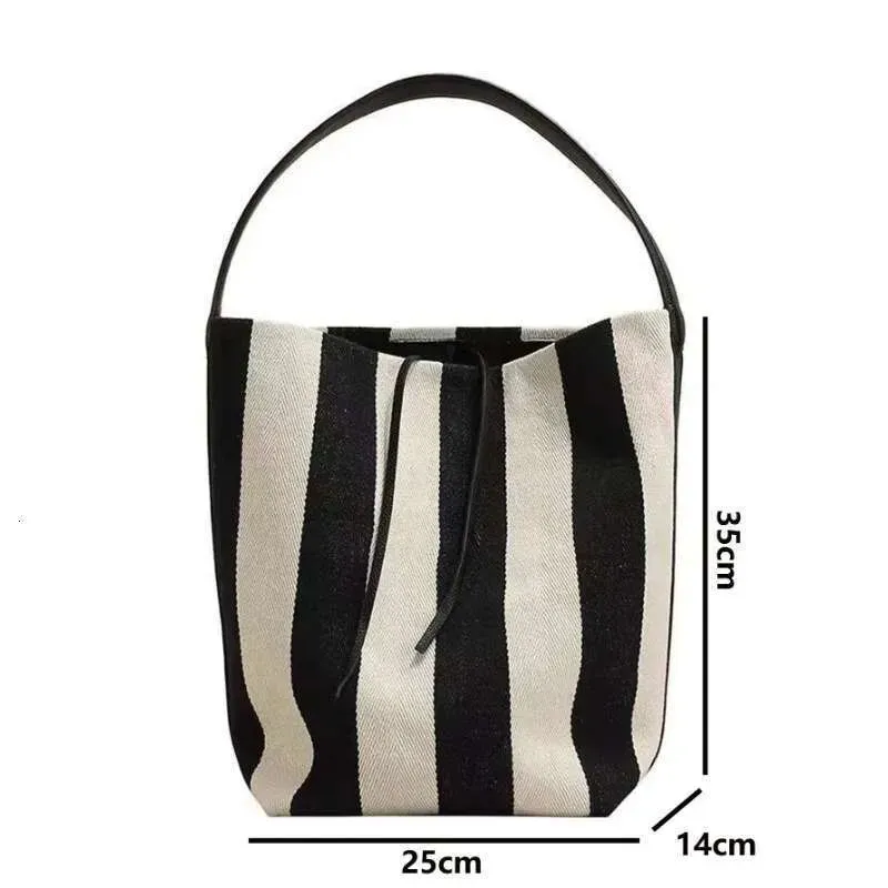 Borse firmate di alta qualità, borse a tracolla da donna alla moda, a righe bianche e nere, di grande capacità, per lo shopping_voghion.com