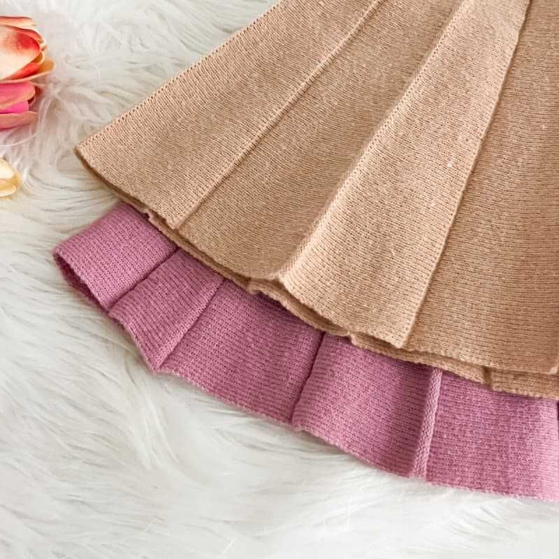 2025 neue Mädchen Gestrickte Pullover Zwei Stück Koreanische Rundhals Einfarbig Bowknot Hohl Einreiher Anzug Rock_voghion.com