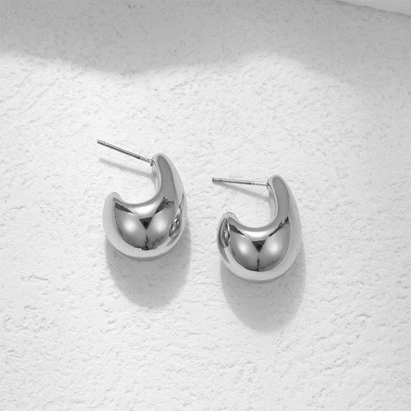 Orecchini a bottone semplici e geometrici a goccia d'acqua per donna, stile minimalista versatile, 2023, gioielli_voghion.com