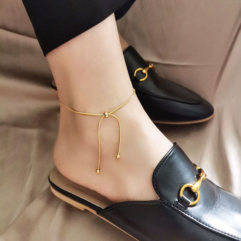 Bohemian Ethnic Snake Bone Pull Foot Chain Female Titanium Steel Non-fading Light Luxury Niche Design Bare Chain Adjustable High-end Foot Decoration_voghion.com
