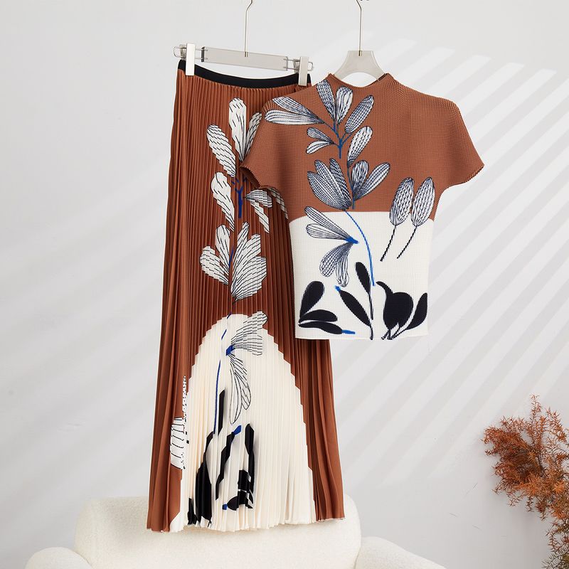 Vêtements pour femmes été nouveau style rajeunissant haut plissé extensible jupe imprimée costume de mode deux pièces_voghion.com
