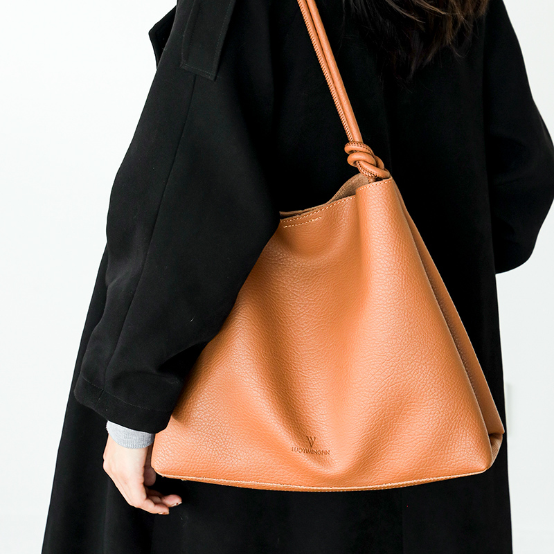 Borsa da donna di design di nicchia autunno/inverno 2022 new fashion texture piccola borsa a tracolla trasparente borsa a secchiello ascella portatile_voghion.com