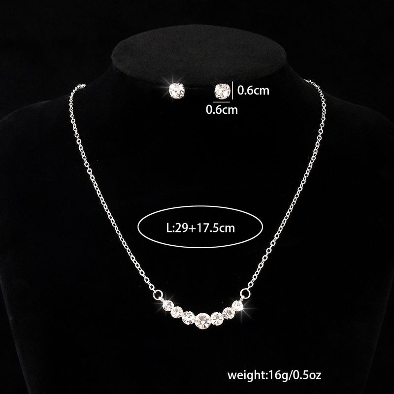 Set di gioielli da donna con collana di strass scintillanti, orecchini e bracciale coordinati, design geometrico per feste serali e uso quotidiano_voghion.com