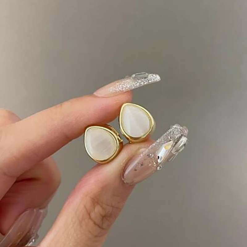 Authentic Niche Design Ice Transparent Cat's Eye Stone Double-Sided Water Drop Exquisite Versatile Earrings Elegant_voghion.com