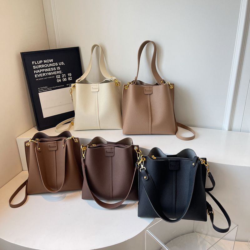 Borsa a tracolla grande e capiente da donna, modello secchiello, 2025, nuova moda autunnale, versatile, con tracolla larga e semplice texture_voghion.com