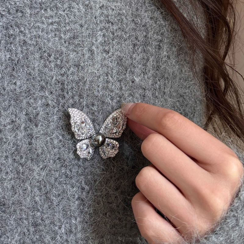 Shijia Tahitiaanse zwarte parel vlinder broche dames pak trui accessoires pin niche ontwerp licht luxe high-end_voghion.com