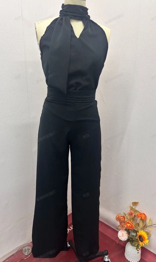 Dameskleding mode holle ronde hals mouwloze top wijde pijpen broek temperamentpak_voghion.com