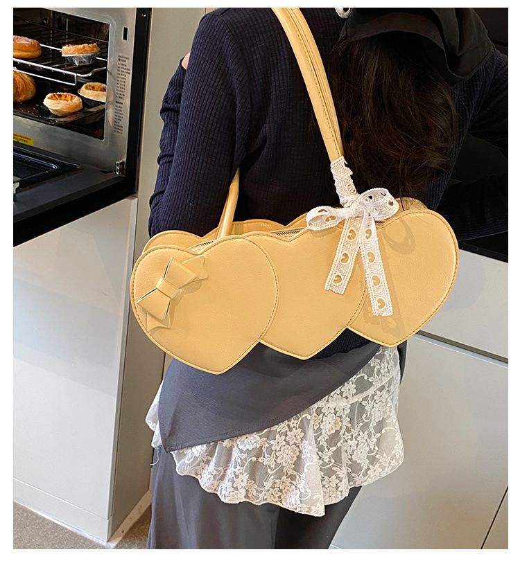 Bolsa de ombro feminina em formato de coração, nova coleção outono/inverno 2025, elegante e versátil_voghion.com