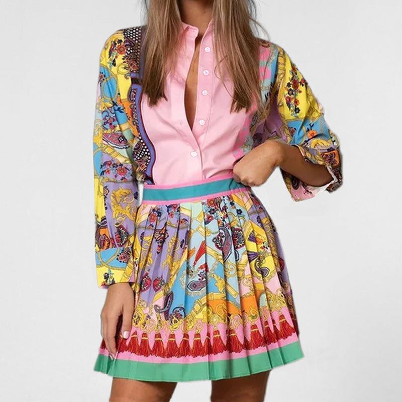 Set due pezzi da donna con maglietta a maniche lunghe stampata e gonna a pieghe, nuovo modello primavera 2025_voghion.com